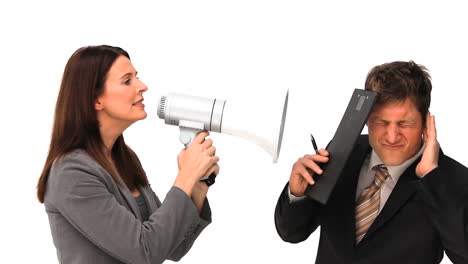 businesswoman giving orders through a megaphone