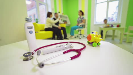 family at doctor on consultation. doctor talking with family about medical treatment