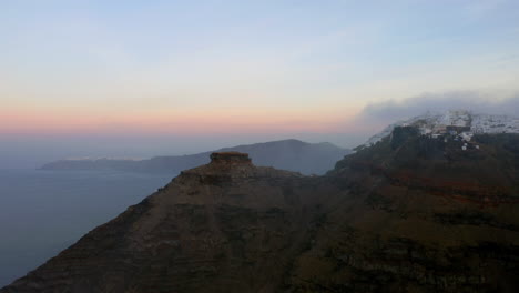 misty morning view of imerovigli in santorini of greece, aerial