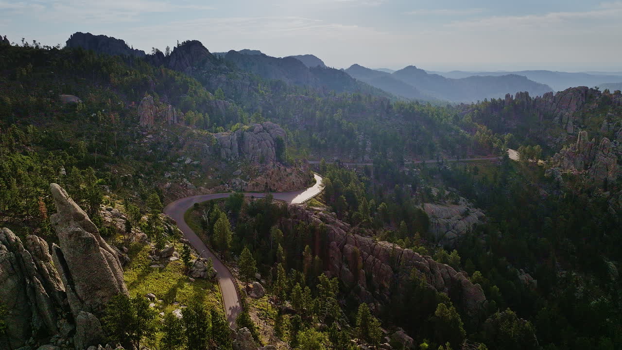 Aerial footage unveiling the raw beauty of ancient rock formations in the American West.