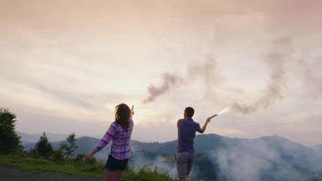 young couple playing with smoke chips 2