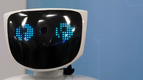 robot face with blue eyes robot face with blue eyes smart robot with artificial intelligence exhibition of modern technologies