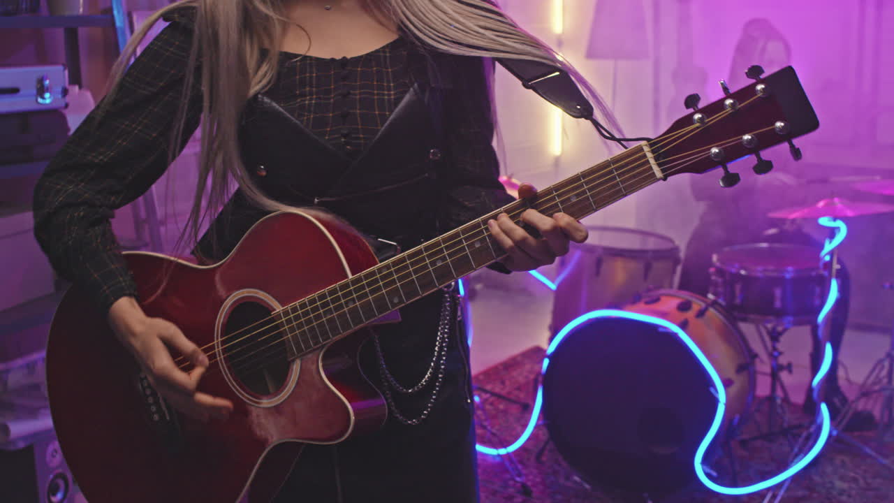 Girl Rocking Out With Guitar During Concert