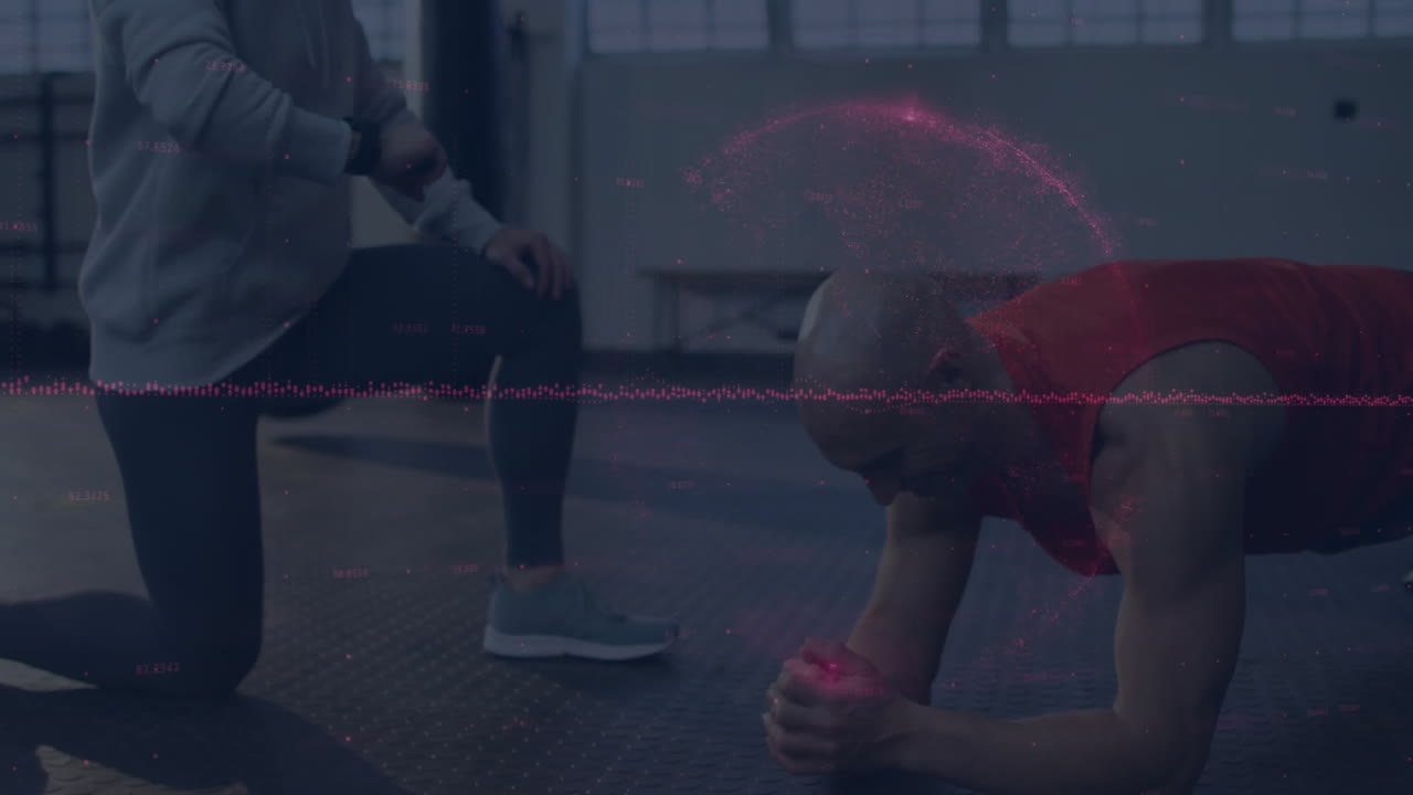 fitness trainer kneeling checking smartwatch, client holding forearm plank in gym with data overlay