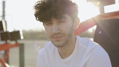 young man at outdoor gym