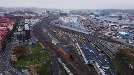 gothenburg central station - train travelling on railroad track of central train station in gothenburg, sweden