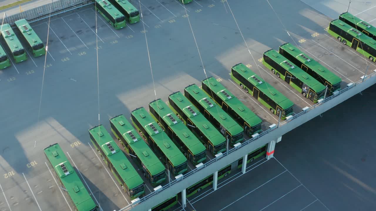 Drone Aerial of Bus Park. Green Electric Buses on Parking, Public Transportation in Stavanger, Norway