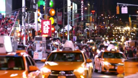 busy nighttime street scene in new york city