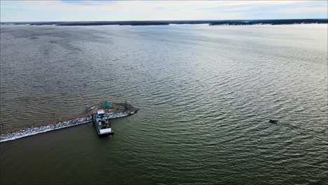 tracking speedboat into the marina at lighthouse landing on the shores of kentucky lake