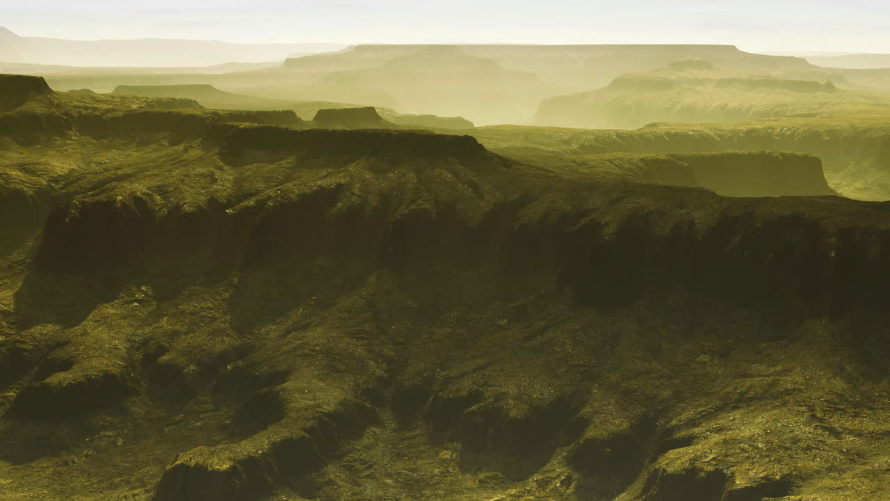 Vast green canyon landscape under soft light in early morning