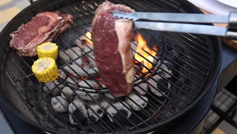 grilled steak and corn on the cob