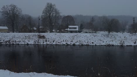 snowy day in rosendale new york, on the banks of the rondout creek, during a nor'easter