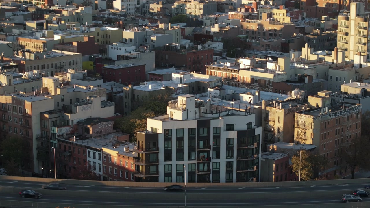 Aerial view of traffic on the Brooklyn Queens Expressway. Shot in Williamsburg, Brooklyn at dusk.