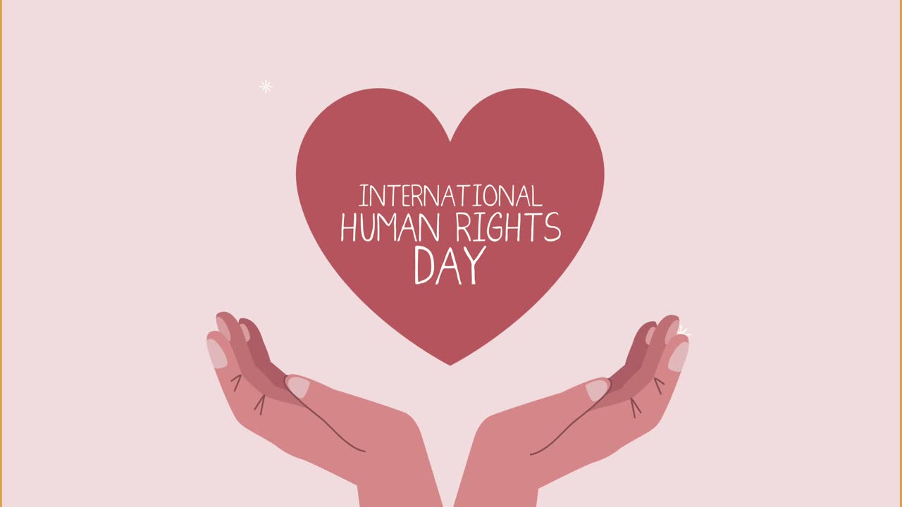human rights lettering in heart with hands