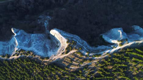 aerial view of unique rock formations and forest landscape