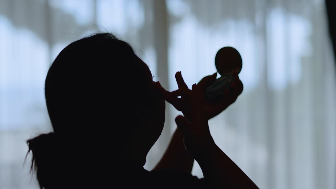 Woman Applying Makeup