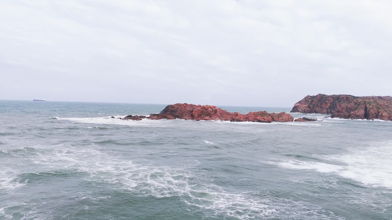 Aerial View of the Rocks and Ship in the Water.