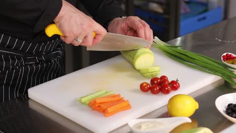 chef preparing a colorful vegetable salad