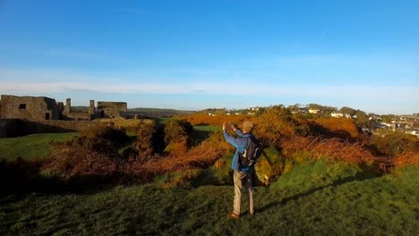 Male-hiker-hiking-in-countryside-4k