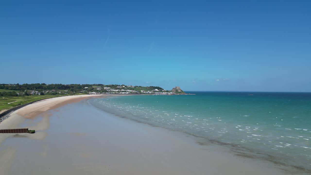 gorey beach jersey ascending drone,aerial blue sky in summer