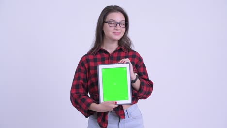 happy young beautiful hipster woman with digital tablet