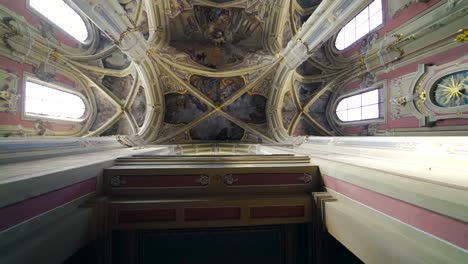 interior of the old cathedral of the assumption of the blessed virgin mary. beautiful view of religious building inside. camera moves upside down.