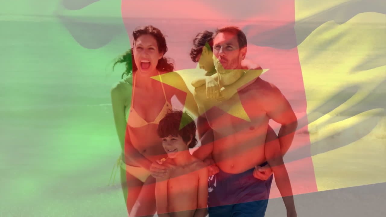 At beach, family playing with Cameroon flag overlay in animation