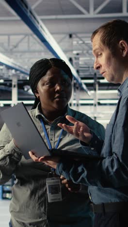 Vertical Video Data Center Coworkers Doing Brainstorming, Monitoring Deep Learning Processes