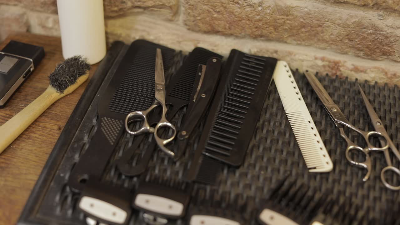 Shaving set with equipment, tools and foam, barber shop, scissors, comb on desk