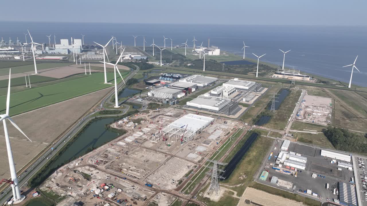 Large data center in the Eemshaven, aerial drone video, The Netherlands. IT infrastructure, big data, servers, AI technology. Artificial intelligence tech.