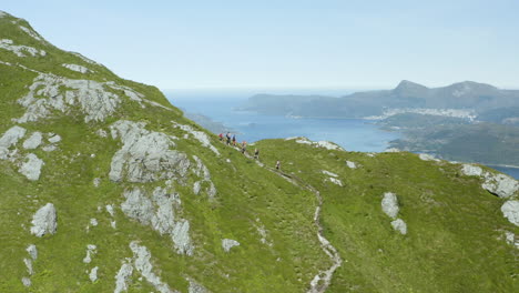 aerial footage of hornhelen in norway. this is an 860-meter tall cliff straight up from the fjords bellow