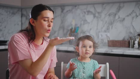 A Playful Moment Between a Caring Adult and a Curious Child in a Modern Kitchen, Showcasing Joyful Interactions and Floury Fun in Cooking Activities