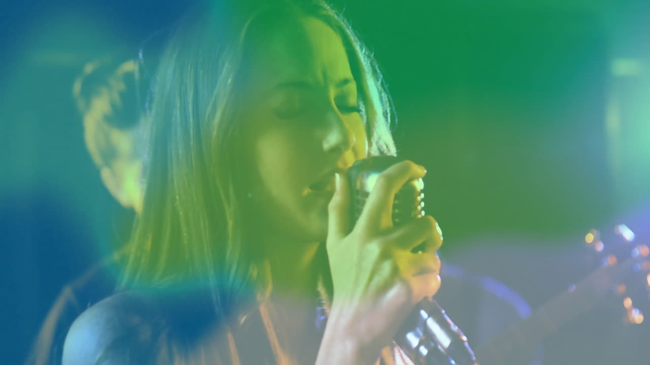 Female singer performing on music stage, projecting animated equalizer bars and neon note icons
