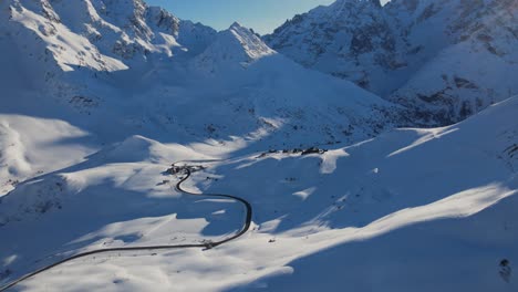 drone footage of a peaceful snowy mountain range