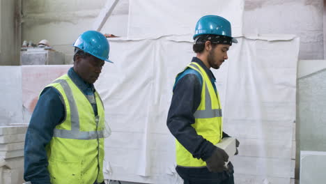 workmates in a marble factory