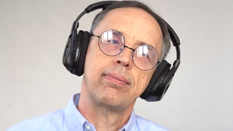 happy older man listening to music