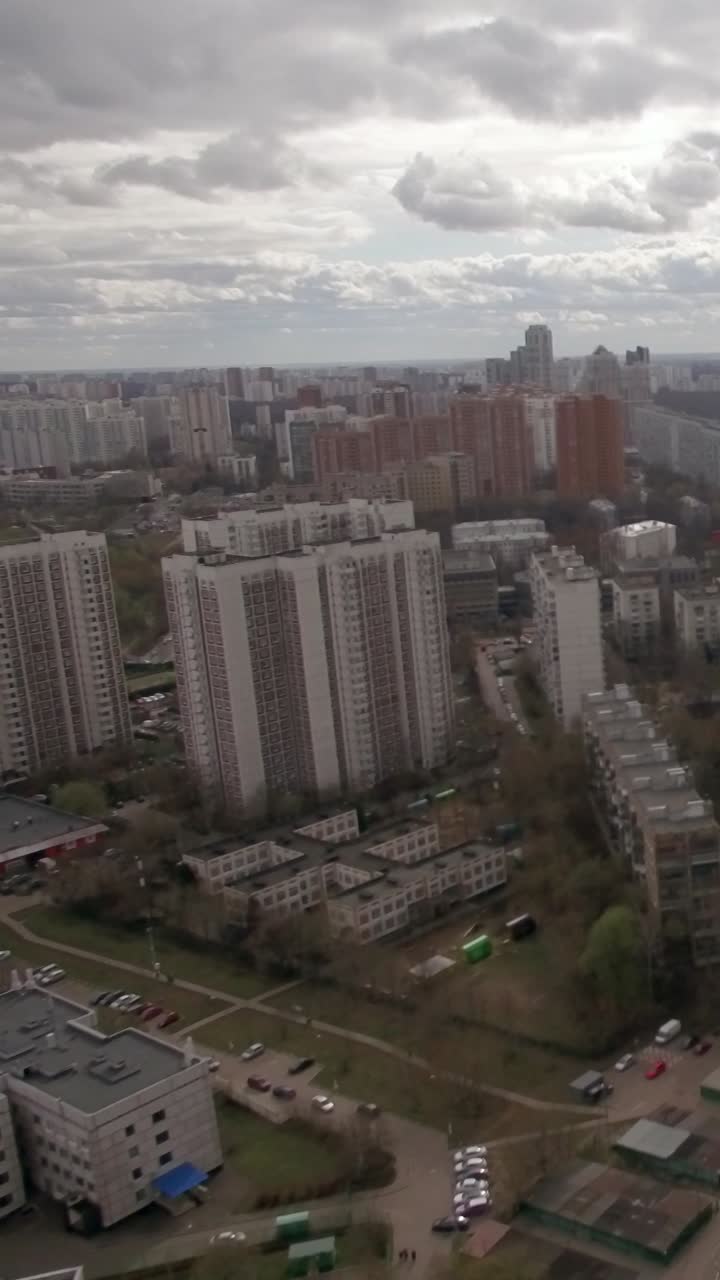 Vista Aérea de uma Vasta Paisagem Urbana com Edifícios Residenciais