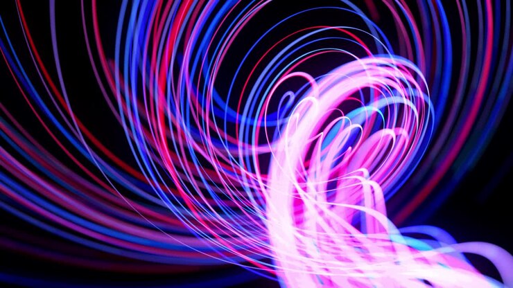 Light flow bg in 4k. Abstract looped background with light trails, stream of red blue neon lines in space move to form looped spiral shapes. Modern trendy motion design background. Light effect,