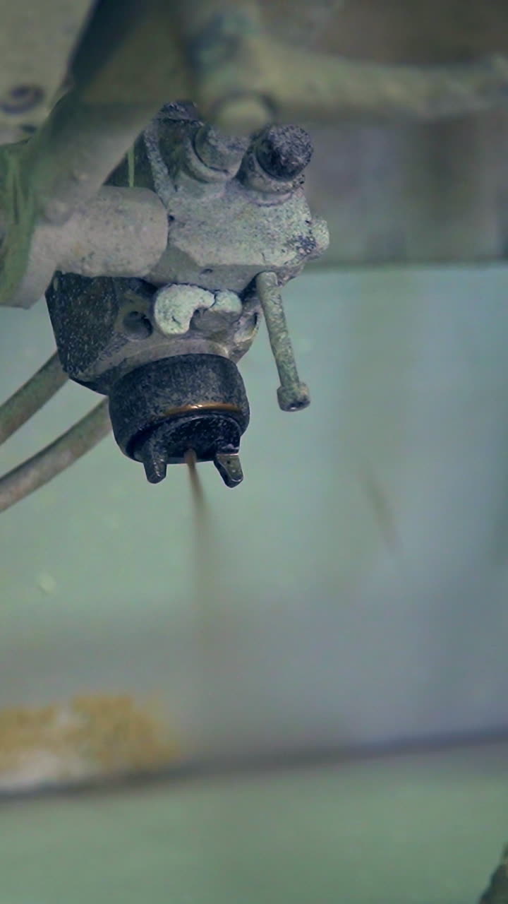 Spraying machine for applying varnish or paint on the product. Equipment at modern door manufacturing enterprise. Vertical video