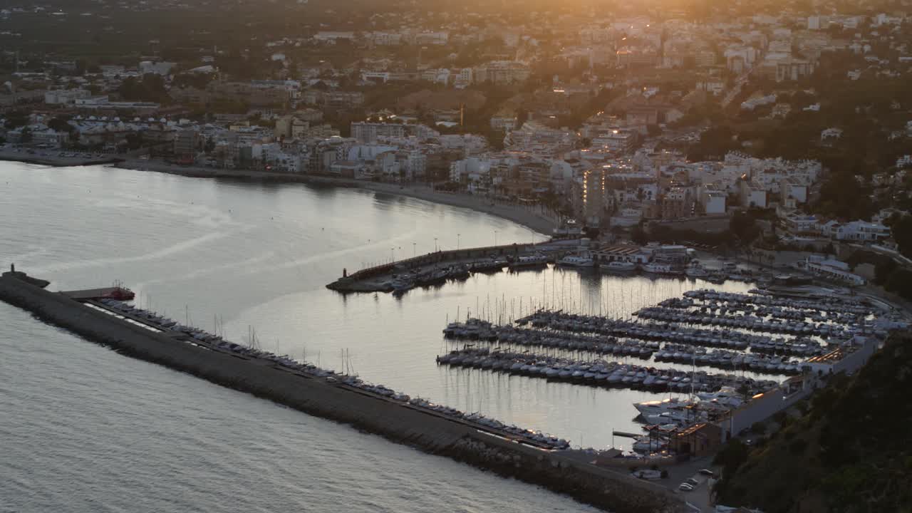 vista del puerto de javea al atardecer desde cabo san antonio