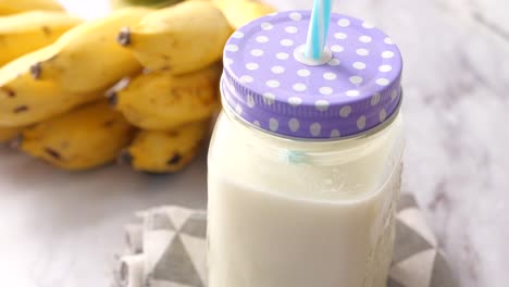 banana smoothie in a glass jar