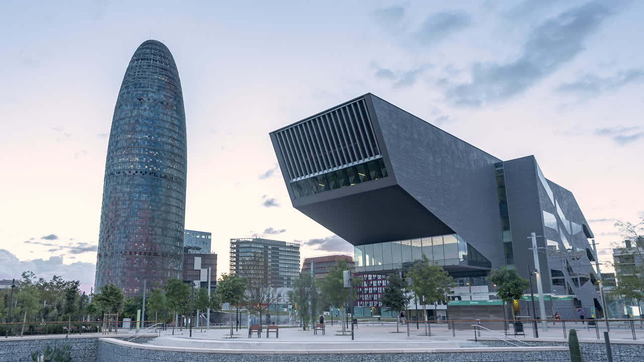Timelapse of Glories Metro Station In Barcelona and skyline during sunrise
