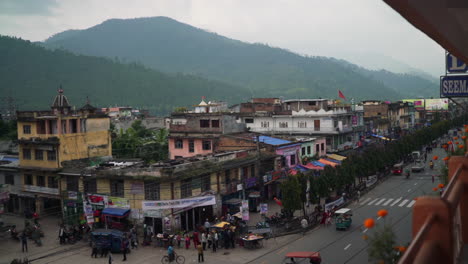 panning shot of a busy street in a nepalees city on a cloudy day