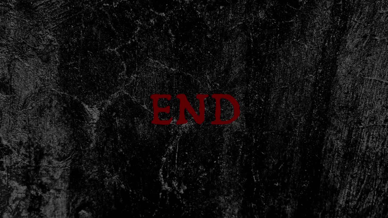 Red 'END' Text Fading on Dark Grunge Background
