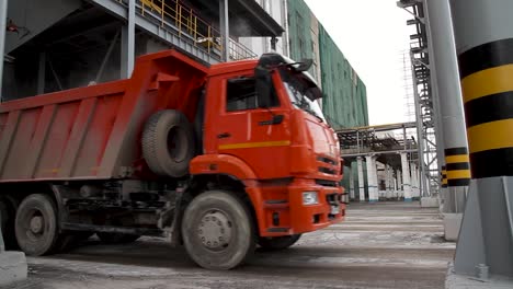 dump trucks at industrial site