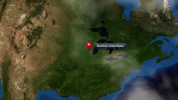 Satellite animation zooms from outer space into North America, pinpointing Rockford, United States. Includes NASA public domain imagery.