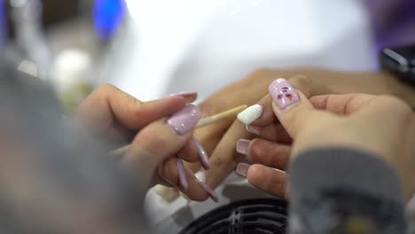 a special acrylic texture is applied to the nail and corrects the shape of the