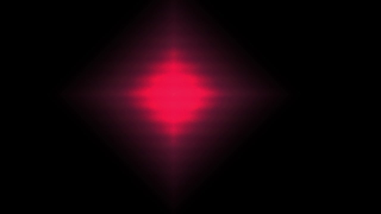 Pulsing Red Diamond Shaped Light Effect on Black Background