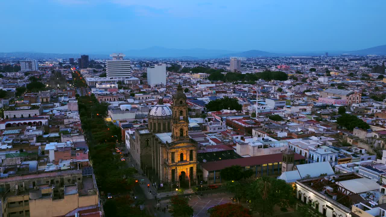 Aerial view of Templo San José de Gracia illuminated at dusk in Guadalajara, Mexico