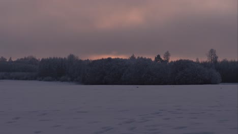 timelapse of colorful sunset with vivid clouds during winter landscape